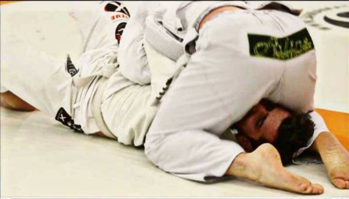 Exterior or interior of MMA y Lucha Grappling